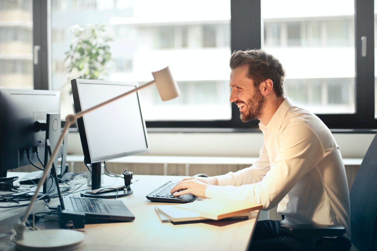 business man looking at his computer